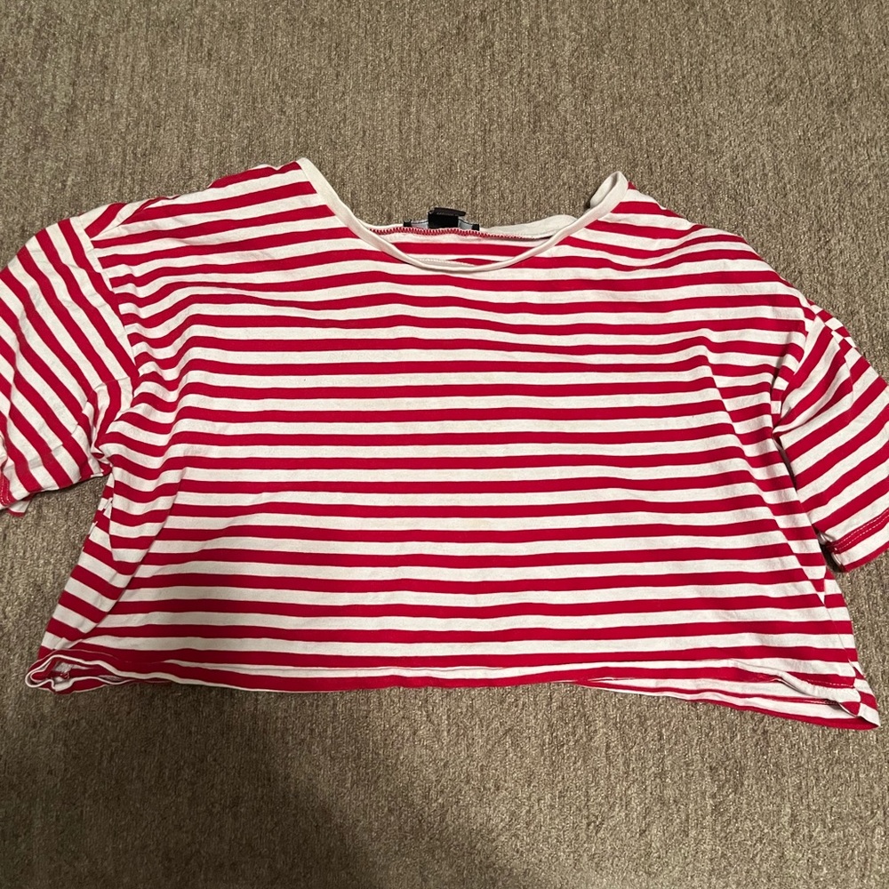 This is a stripped crop top that has never been worn